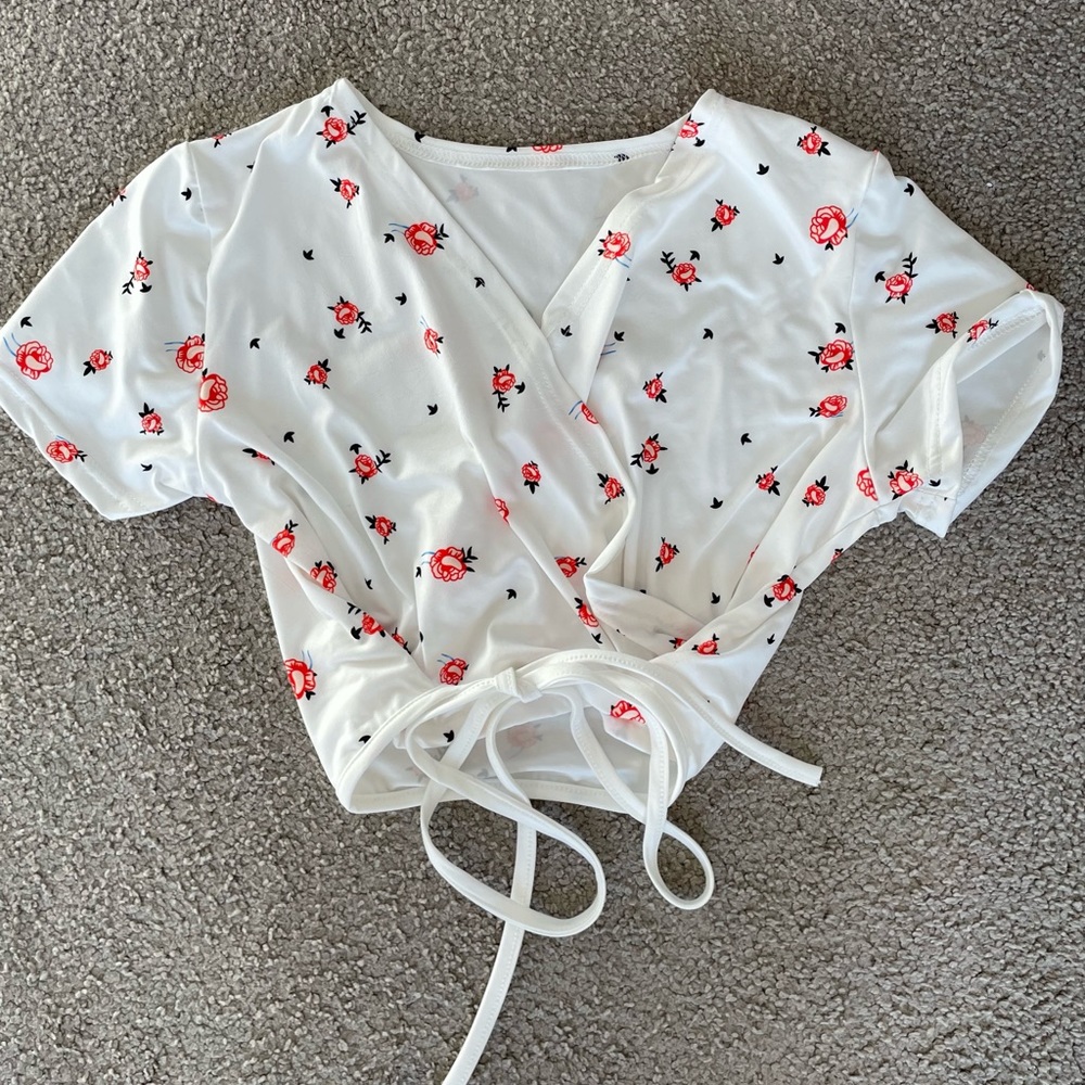 white patterned wrapped crop top
